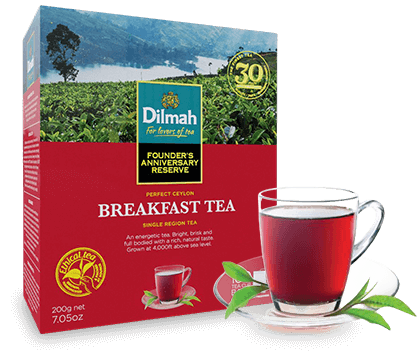 Breakfast Tea Pack and a Cup of Tea with Tea Leaves